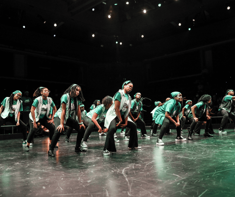 Summer Steps with Step Afrika!'s Green Team performing during the culminating step show.